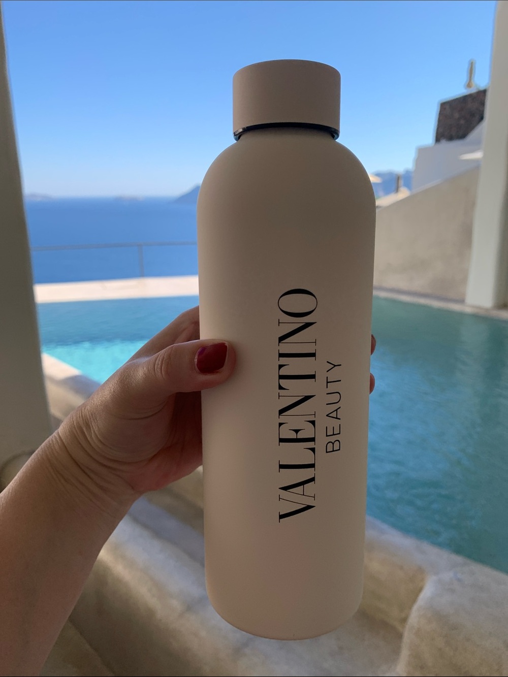 Brand new in box, authentic Valentino from Italy ivory water bottle. Must have!